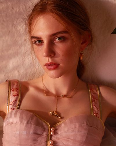 Contemporary Romantic Off-Shoulder Blouse with Pearl Button Details